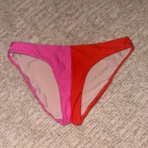 pink and red half-and-half swimsuit bottoms